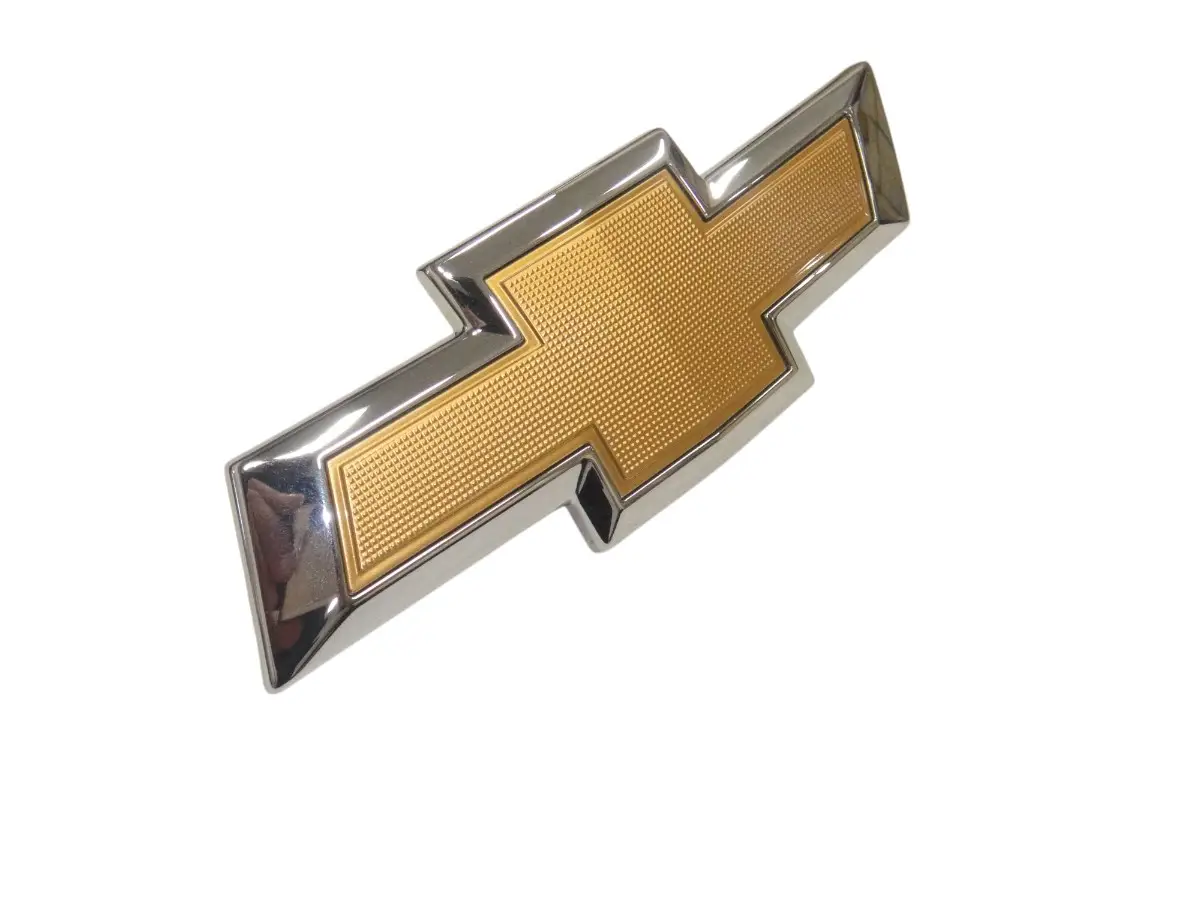 26224695 Emblema Delantero -moño- Onix G2