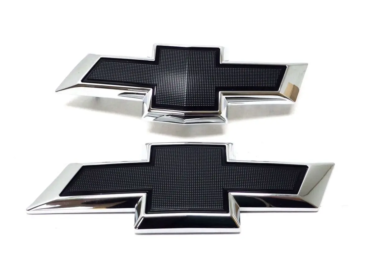 84151500 Emblema Delantero Y Trasero -moños Negros- Cruze B 5p /19